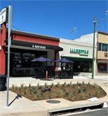 Landscaping crews planting new greenery. 