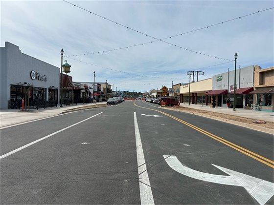 New, wider sidewalks and paved street completed along Grand Avenue