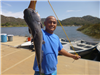 Thongwan Khammao of City Heights, 7.60 pound catfish caught 7-18-21 using raw shrimp dipped in hog p
