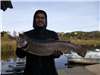 Chris Sy of San Diego, 6.70 pound trout caught 12-21-19 using pink powerbait at east end.
