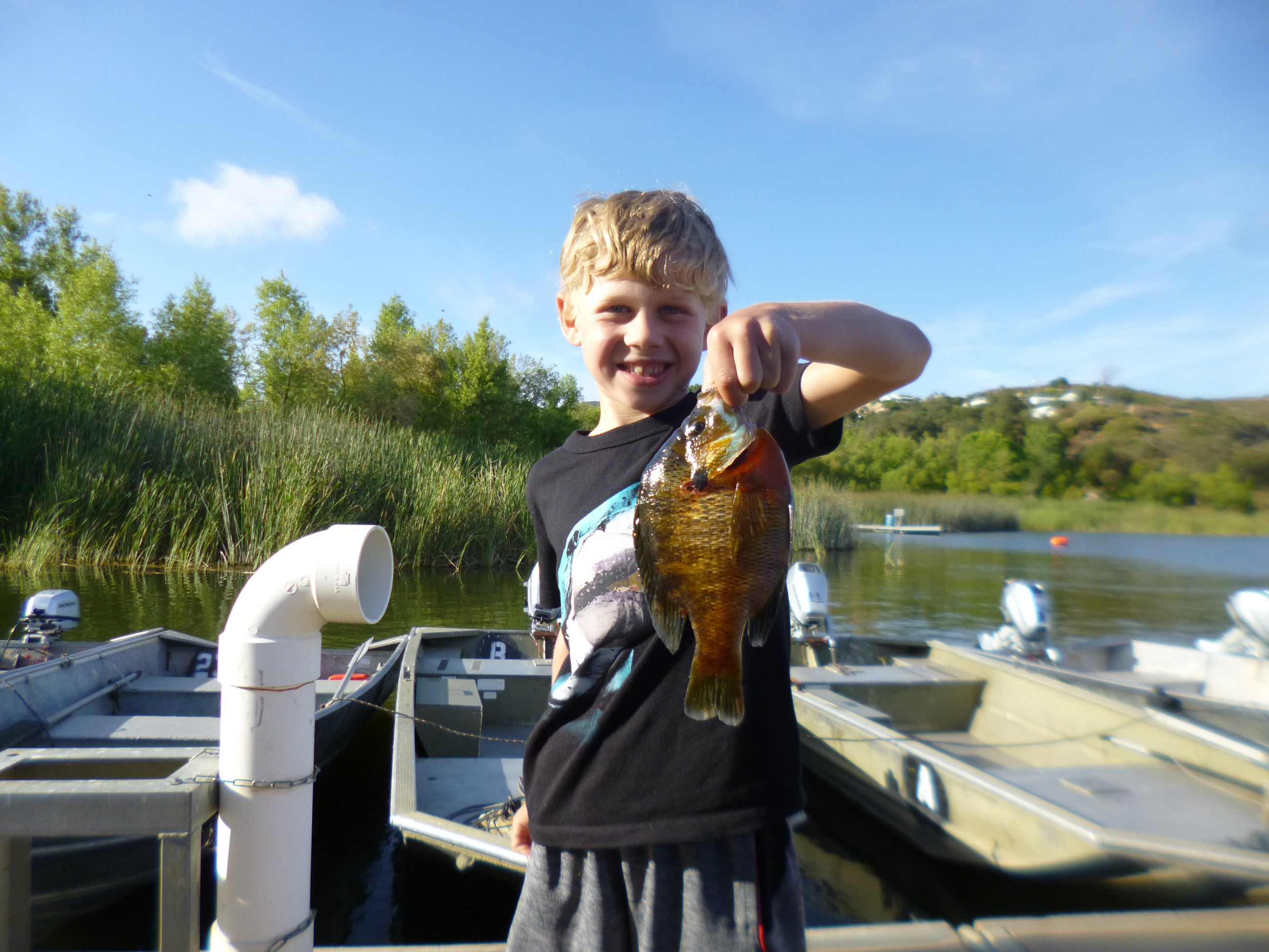 Brayden Emily (7) of Ramona, .50 pound Bluegill caught 6-4-22 using a worm at the Crappie Float .