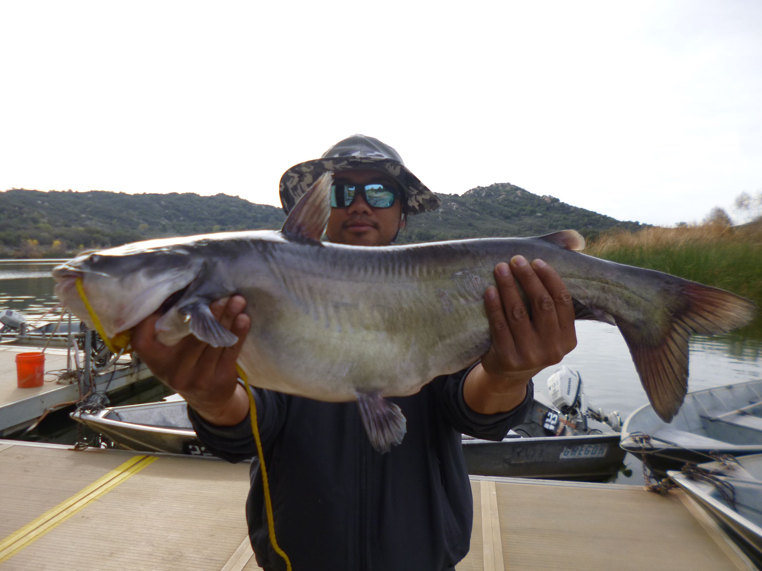 Xai Xiong, 12.20 pound catfish caught 12-27-22 using shrimp at the west buoys.