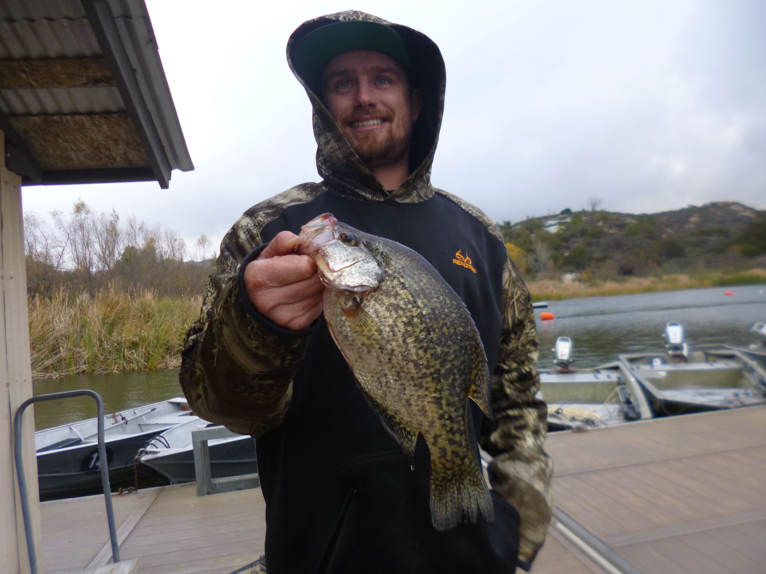 Cameron Gruwell of Valley Center, 1.20 pound crappie caught 12-31-21 using a mini-jig at the west bu