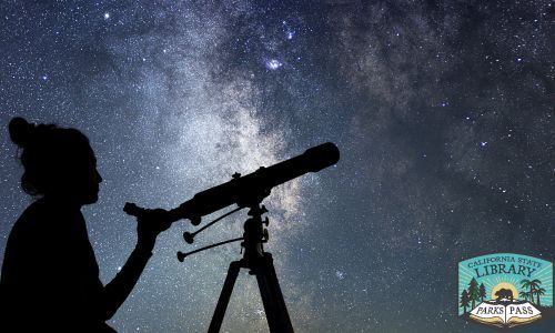 Woman using a telescope